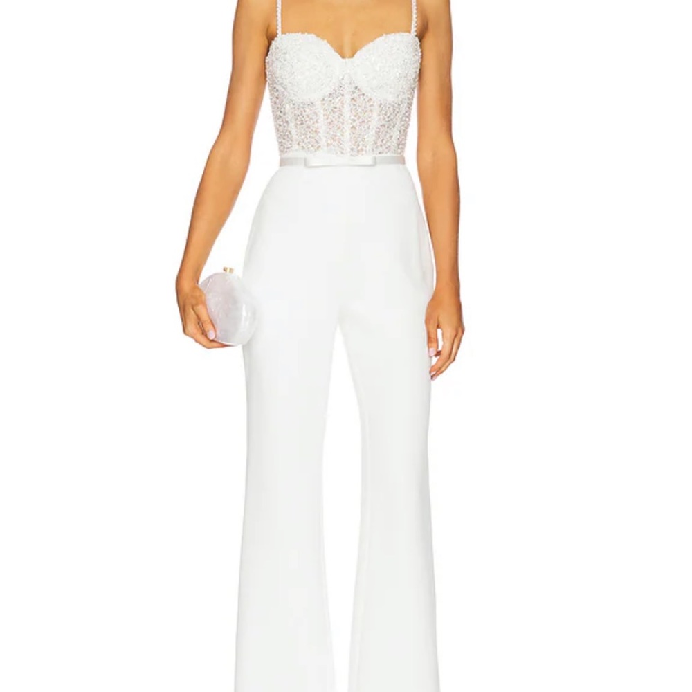 Nadine Merabi: Elegant White Lace Bustier Jumpsuit